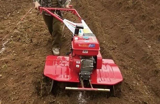Μικρή περιστροφική καλλιεργητών σκάβοντας μηχανή πηδαλίων βενζίνης μίνι χαμηλού θορύβου